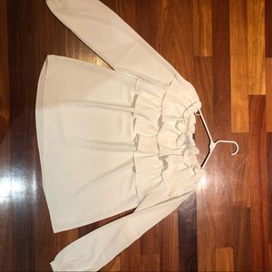 White flowy top with ruffles